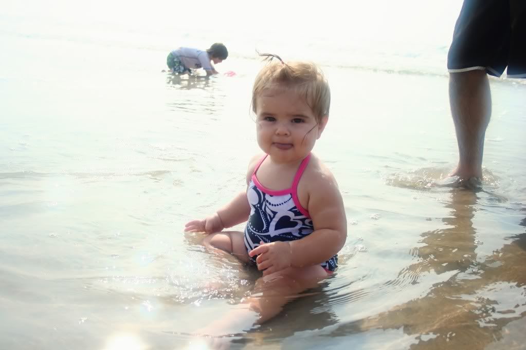 Lorelai sitting in the water