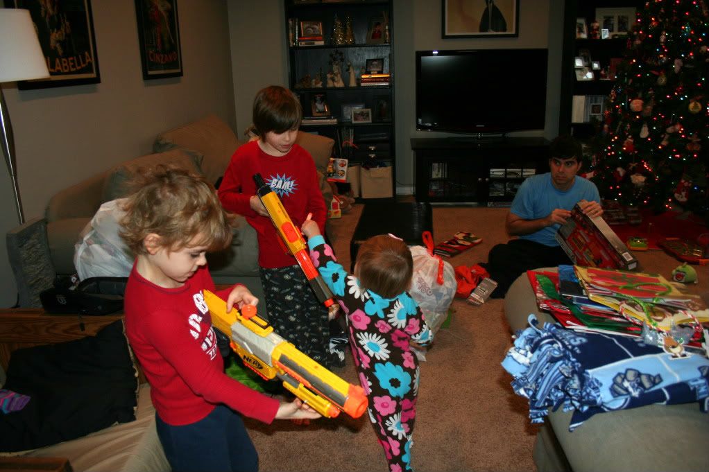 playing with nerf blasters from Santa